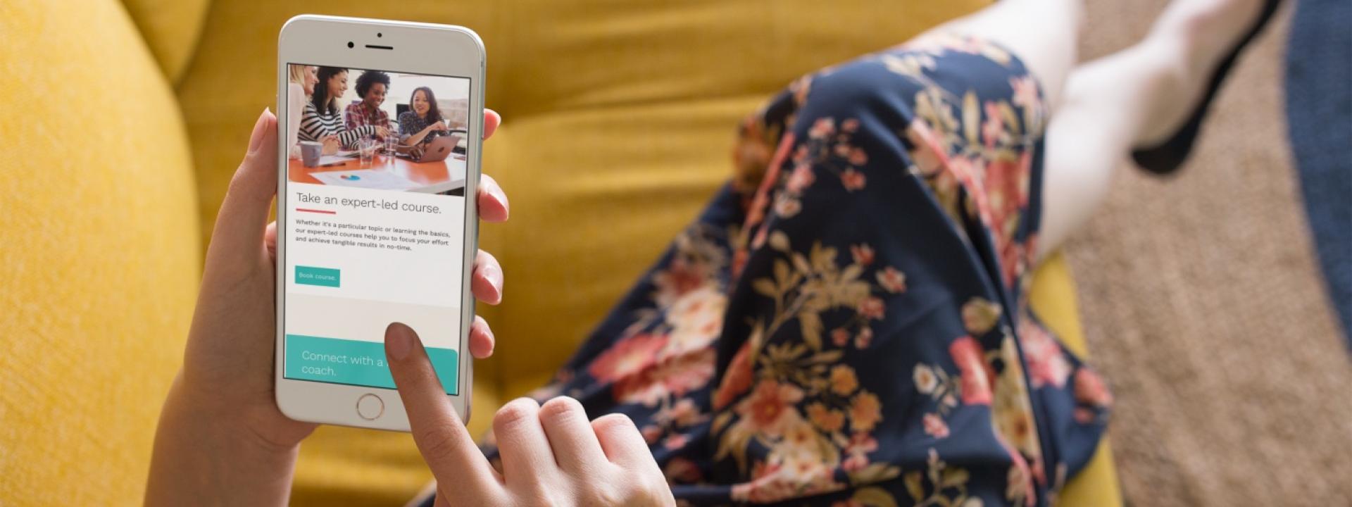 Woman looking at iPhone