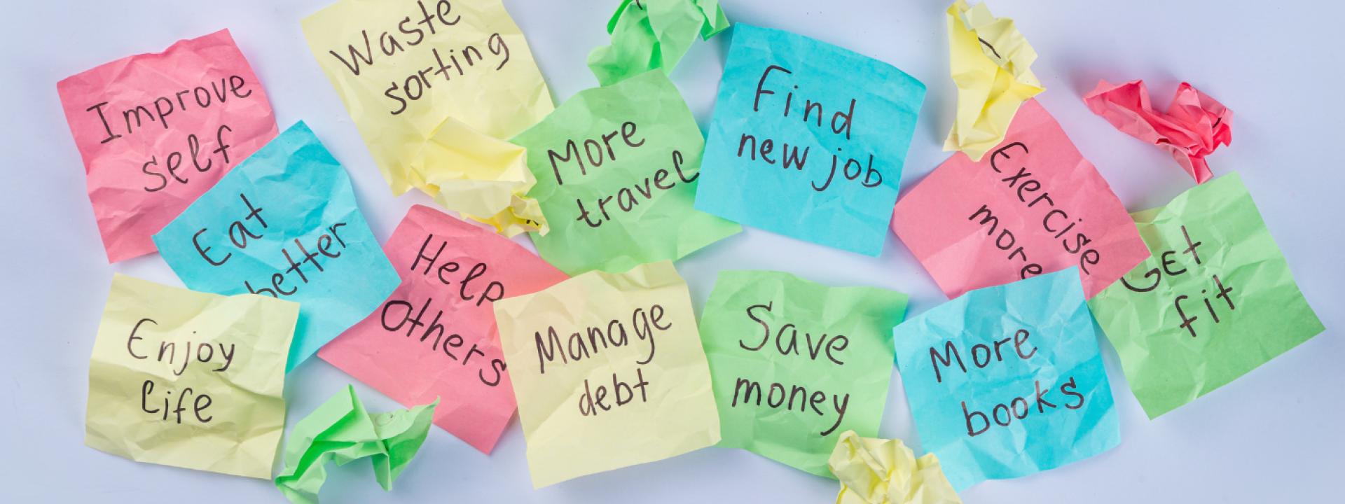 Postits with new years resolutions Postits with lots of new years fun
